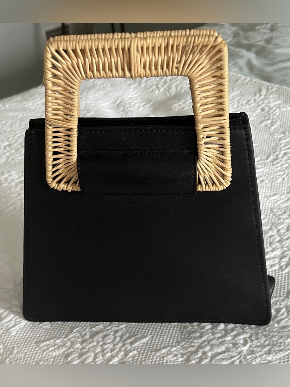 Cute summery black purse.  Carried once or twice
